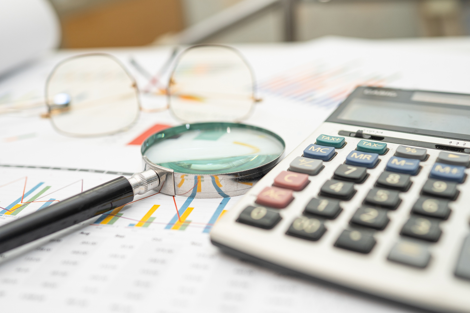 Calculator on Chart and Graph Spreadsheet Paper. Finance Develop
